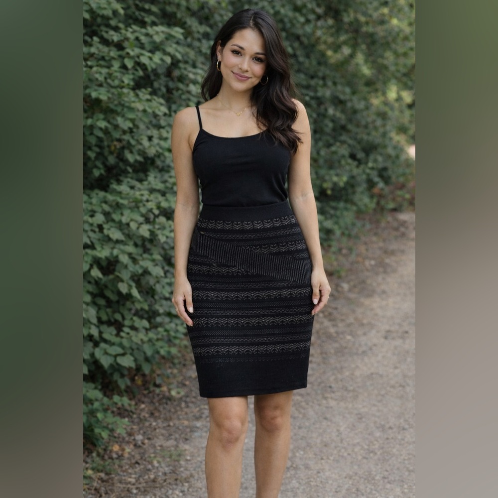 Never used Rachel Roy black knitted skirt with attached tan slip underne…